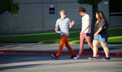 Group of students walking for insurance