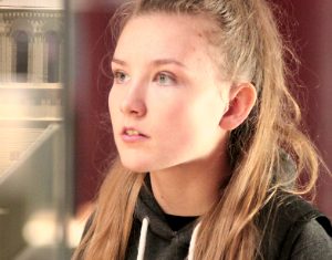 girl looking at exhibit