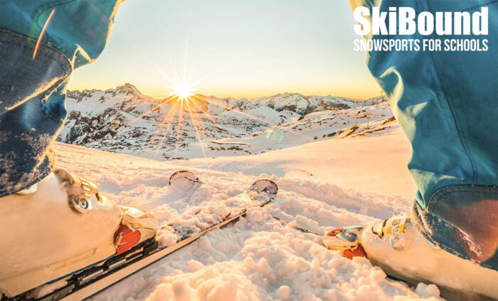 Skier,Athlete,Standing,In,Front,Of,Wonderful,Sunset,In,Ski