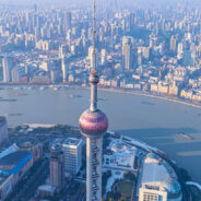 Aerial,View,Of,Shanghai,Skyline,And,Winding,River,At,Sunrise